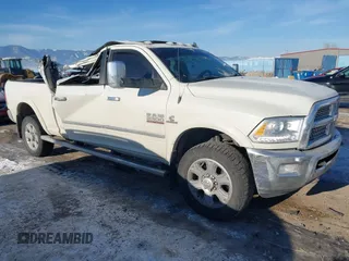 2016 Ram 2500 Laramie with VIN 3C6UR5NLXGG205295, listed as a IAAI auction lot 41445788 with 161,199 mi miles and . Bid and sale history available at DreamBid. Image 1.