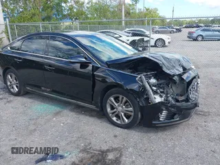 2018 Hyundai Sonata SEL with VIN 5NPE34AF3JH647018, listed as a IAAI auction lot 41687419 with 97,561 mi miles and . Bid and sale history available at DreamBid. Image 17.