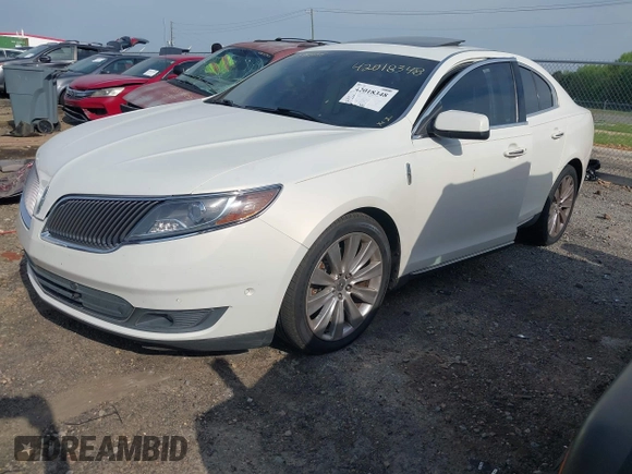 2013 Lincoln MKS EcoBoost with VIN 1LNHL9FT3DG605011, listed as a IAAI auction lot 42018348 with 110,701 mi miles and . Bid and sale history available at DreamBid. Image 2.