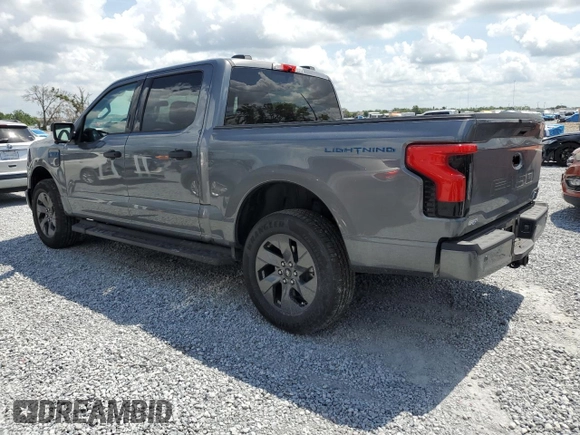 2024 Ford F-150 Lightning XLT with VIN 1FTVW3LK8RWG23783, listed as a Copart auction lot 58359625 with 5,864 mi miles and Salvage title. Bid and sale history available at DreamBid. Image 2.