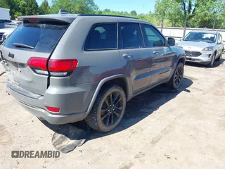 2019 Jeep Grand Cherokee Laredo E with VIN 1C4RJFAG8KC849782, listed as a IAAI auction lot 42151331 with 141,099 mi miles and . Bid and sale history available at DreamBid. Image 4.