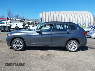 2015 BMW X1 xDrive28i with VIN WBAVL1C59FVY25442, listed as a IAAI auction lot 41854794 with 98,432 mi miles. Bid and sale history available at carsss.com. Image 14.