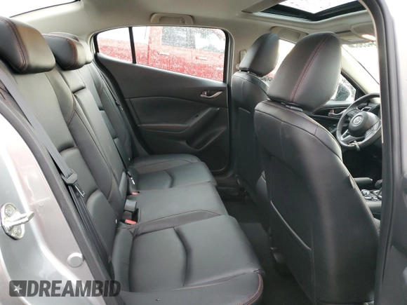 2015 Mazda 3 i Grand Touring z VIN JM1BM1W76F1239689, wystawiony jako Copart lot #55343985 z przebiegiem 14 789 mil mil oraz Szkoda całkowita • Salvage title. Historia ofert i sprzedaży dostępna na DreamBid. Obrazek 10.