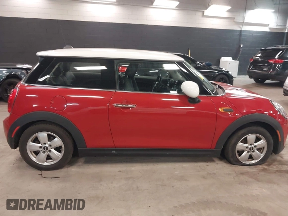 2017 MINI Hardtop Cooper with VIN WMWXP5C37H3C64033, listed as a IAAI auction lot 42028317 with 46,373 mi miles and . Bid and sale history available at DreamBid. Image 13.