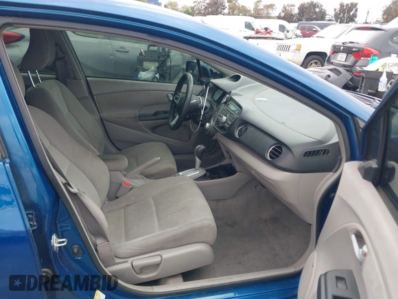 2012 Honda Insight LX with VIN JHMZE2H58CS001411, listed as a IAAI auction lot 42148575 with 155,586 mi miles and . Bid and sale history available at DreamBid. Image 5.