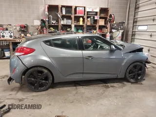 2016 Hyundai Veloster with VIN KMHTC6AD8GU267426, listed as a IAAI auction lot 41349385 with 114,245 mi miles. Bid and sale history available at carsss.com. Image 14.