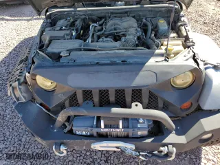 2012 Jeep Wrangler Unlimited Sport with VIN 1C4BJWDGXCL161569, listed as a Copart auction lot 50456355 with 133,703 mi miles and Salvage Title. Bid and sale history available at carsss.com. Image 13.