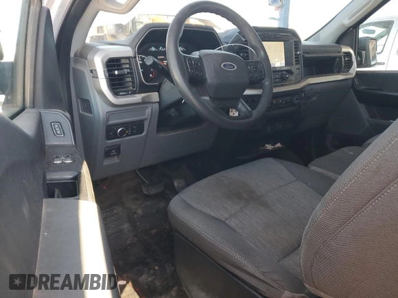 2021 Ford F-150 XL with VIN 1FTMF1C57MKE89519, listed as a Copart auction lot 49420105 with 134,507 mi miles and Salvage title. Bid and sale history available at DreamBid. Image 8.