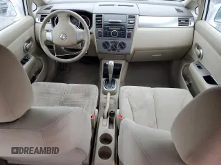2007 Nissan Versa 1.8 SL with VIN 3N1BC11E67L402475, listed as a Copart auction lot 84464734 with 62,399 mi miles and Salvage Title. Bid and sale history available at carsss.com. Image 8.