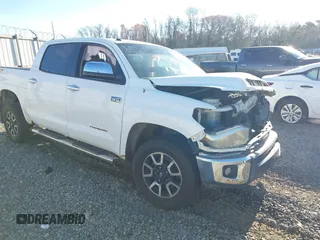 2014 Toyota Tundra 4WD Truck LTD with VIN 5TFHW5F16EX372679, listed as a IAAI auction lot 41736049 with 247,000 mi miles. Bid and sale history available at carsss.com. Image 1.