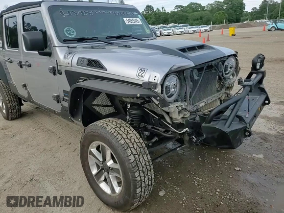 2020 Jeep Gladiator Sport S with VIN 1C6HJTAG9LL127546, listed as a Copart auction lot 54955945 with 99,511 mi miles and Salvage title. Bid and sale history available at DreamBid. Image 14.