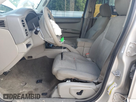 2008 Jeep Commander Sport with VIN 1J8HH48K88C115361, listed as a Copart auction lot 59978715 with 221,157 mi miles and Salvage title. Bid and sale history available at DreamBid. Image 7.
