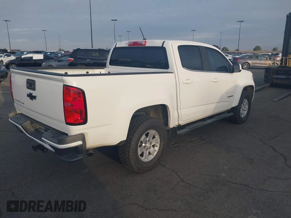 2019 Chevrolet Colorado 2WD Work Truck with VIN 1GCGSBEN0K1144041, listed as a IAAI auction lot 41668092 with 124,017 mi miles and . Bid and sale history available at DreamBid. Image 4.