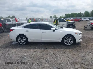 2016 Mazda 6 i Touring with VIN JM1GJ1V56G1448334, listed as a IAAI auction lot 42075222 with 52,883 mi miles. Bid and sale history available at carsss.com. Image 13.