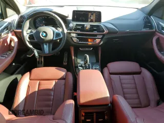2021 BMW X4 M40i with VIN 5UX2V5C05M9H59295, listed as a Copart auction lot 71312963 with 31,050 mi miles. Bid and sale history available at carsss.com. Image 8.