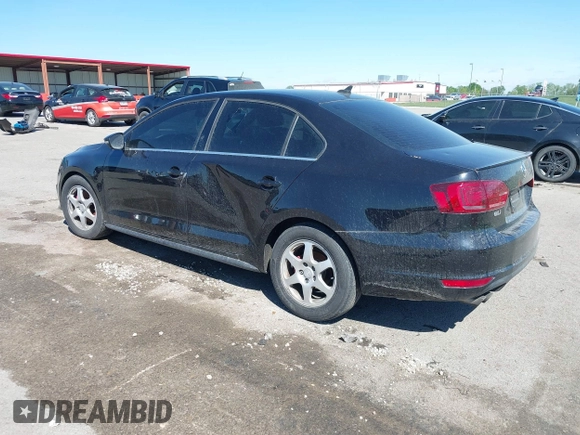2014 Volkswagen Jetta GLI with VIN 3VW4T7AJ5EM382195, listed as a IAAI auction lot 39211126 with 94,735 mi miles and . Bid and sale history available at DreamBid. Image 3.