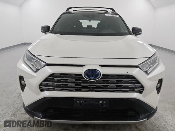 2021 Toyota RAV4 Hybrid XSE with VIN 4T3E6RFV8MU060122, listed as a Copart auction lot 62019045 with 60,971 mi miles and Salvage title. Bid and sale history available at DreamBid. Image 5.