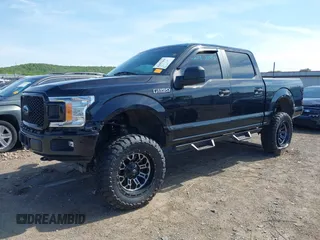 2019 Ford F-150 XL with VIN 1FTEW1EP2KFC91620, listed as a IAAI auction lot 42092443 with 89,305 mi miles and . Bid and sale history available at DreamBid. Image 2.