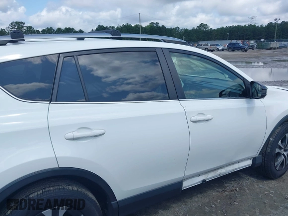 2017 Toyota RAV4 LE with VIN JTMBFREV8HJ700774, listed as a IAAI auction lot 42439345 with 96,907 mi miles and . Bid and sale history available at DreamBid. Image 13.