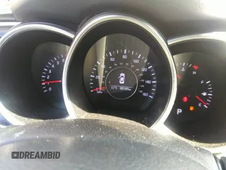 2014 Kia Optima LX z VIN 5XXGM4A70EG321774, wystawiony jako IAAI lot #36053297 z przebiegiem 89 189 mil mil oraz . Historia ofert i sprzedaży dostępna na DreamBid. Obrazek 7.