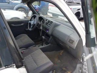1999 Toyota RAV4 with VIN JT3GP10V9X0041656, listed as a IAAI auction lot 41447012 with 8,845 mi miles and . Bid and sale history available at DreamBid. Image 5.