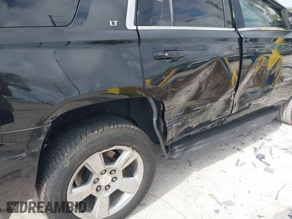 2018 Chevrolet Tahoe LT with VIN 1GNSCBKCXJR132867, listed as a IAAI auction lot 41456319 with 59,131 mi miles and . Bid and sale history available at DreamBid. Image 17.