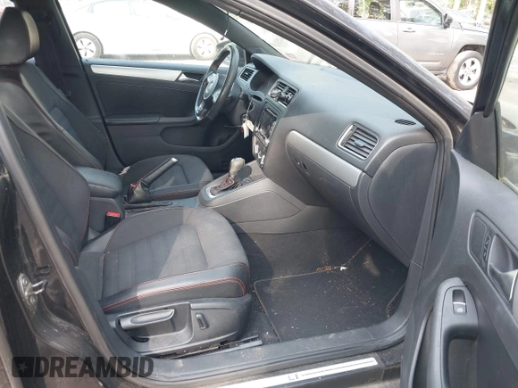 2013 Volkswagen Jetta GLI Autobahn with VIN 3VW467AJ2DM215802, listed as a IAAI auction lot 42077962 with 102,339 mi miles and . Bid and sale history available at DreamBid. Image 5.