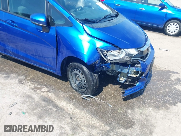 2020 Honda Fit LX with VIN 3HGGK5H43LM703494, listed as a IAAI auction lot 42308518 with 67,452 mi miles and . Bid and sale history available at DreamBid. Image 6.