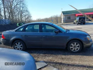 2005 Ford Five Hundred SE z VIN 1FAFP231X5G145153, wystawiony jako IAAI lot #42059747 z przebiegiem 59 114 mil mil oraz . Historia ofert i sprzedaży dostępna na DreamBid. Obrazek 13.