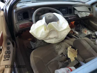 2000 Mercury Grand Marquis LS z VIN 2MEFM75W9YX660599, wystawiony jako Copart lot #52620225 z przebiegiem 88 726 mil mil oraz Szkoda całkowita • Salvage title. Historia ofert i sprzedaży dostępna na DreamBid. Obrazek 8.