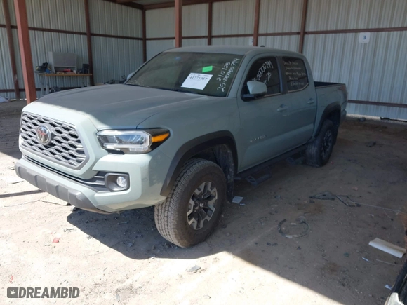 2023 Toyota Tacoma 4WD SR with VIN 3TMCZ5ANXPM613857, listed as a IAAI auction lot 41771957 with 76,232 mi miles. Bid and sale history available at carsss.com. Image 2.