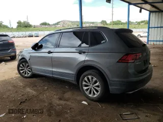 2018 Volkswagen Tiguan S with VIN 3VV1B7AXXJM054778, listed as a Copart auction lot 61294795 with 87,330 mi miles and Salvage title. Bid and sale history available at DreamBid. Image 2.