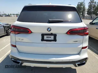 2019 BMW X5 xDrive40i with VIN 5UXCR6C57KLK85504, listed as a Copart auction lot 60908665 with 21,333 mi miles and Salvage title. Bid and sale history available at DreamBid. Image 6.