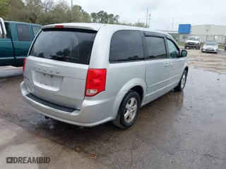 2012 Dodge Grand Caravan SE with VIN 2C4RDGBG9CR171211, listed as a IAAI auction lot 41713553 with 230,992 mi miles. Bid and sale history available at carsss.com. Image 4.