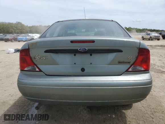2004 Ford Focus SE z VIN 1FAFP34384W130421, wystawiony jako Copart lot #54045255 z przebiegiem 172 319 mil mil oraz Szkoda całkowita • Salvage title. Historia ofert i sprzedaży dostępna na DreamBid. Obrazek 6.