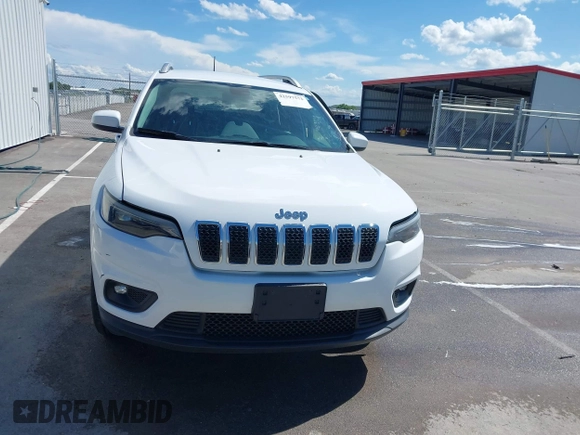 2019 Jeep Cherokee Latitude with VIN 1C4PJMCB6KD284293, listed as a IAAI auction lot 42597573 with 112,301 mi miles and . Bid and sale history available at DreamBid. Image 12.