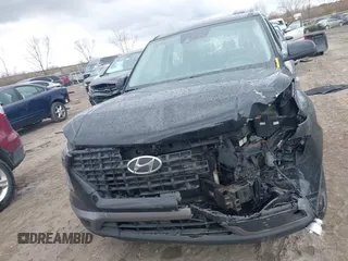 2021 Hyundai Venue SE with VIN KMHRB8A30MU089295, listed as a IAAI auction lot 42037102 with 76,936 mi miles and . Bid and sale history available at DreamBid. Image 12.