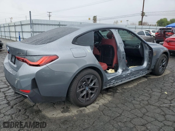 2023 BMW i4 eDrive40 with VIN WBY73AW08PFR23464, listed as a Copart auction lot 43525124 with 6,596 mi miles. Bid and sale history available at carsss.com. Image 3.
