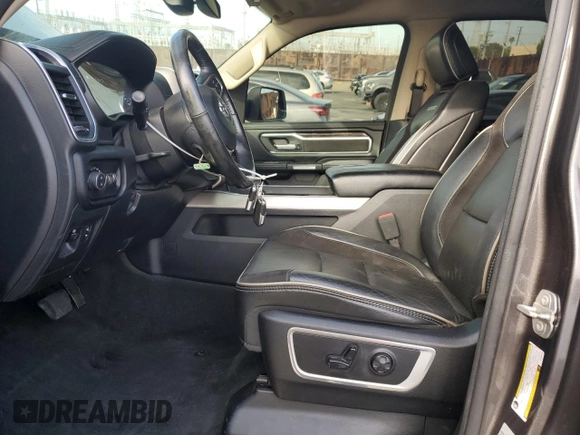 2020 Ram 1500 Laramie with VIN 1C6SRFDT1LN263036, listed as a Copart auction lot 48560655 with 130,923 mi miles and Salvage Title. Bid and sale history available at carsss.com. Image 7.