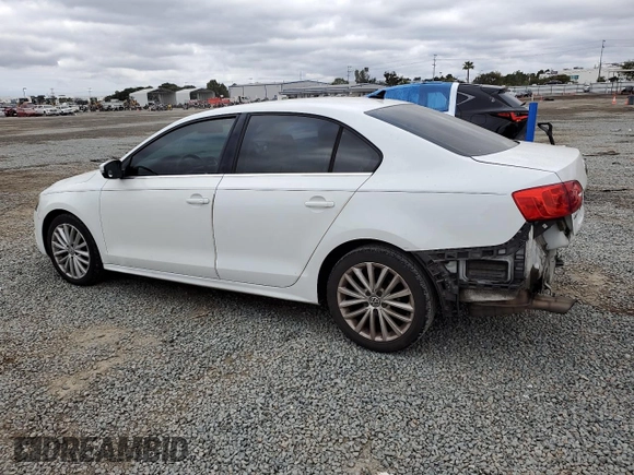 2014 Volkswagen Jetta TDI w/Premium/Nav with VIN 3VWLL7AJ0EM332476, listed as a Copart auction lot 50069445 with 153,974 mi miles and Salvage title. Bid and sale history available at DreamBid. Image 2.