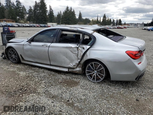 2018 BMW 7 Series 740i with VIN WBA7E2C53JG742711, listed as a Copart auction lot 51643505 with 0 mi miles and Salvage Title. Bid and sale history available at carsss.com. Image 2.