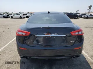 2017 Maserati Ghibli with VIN ZAM57XSA9H1238334, listed as a Copart auction lot 53439293 with 106,711 mi miles. Bid and sale history available at carsss.com. Image 6.