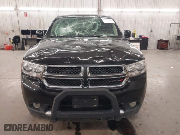 2013 Dodge Durango SXT with VIN 1C4RDJAG0DC512293, listed as a IAAI auction lot 41875919 with 191,128 mi miles and . Bid and sale history available at DreamBid. Image 13.