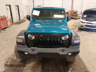2019 Jeep Wrangler Unlimited Sport Altitude with VIN 1C4HJXDG0KW617379, listed as a IAAI auction lot 42005517 with 91,296 mi miles and . Bid and sale history available at DreamBid. Image 12.