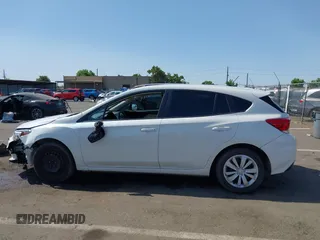 2018 Subaru Impreza with VIN 4S3GTAA64J3717886, listed as a IAAI auction lot 42572412 with 91,911 mi miles and . Bid and sale history available at DreamBid. Image 14.