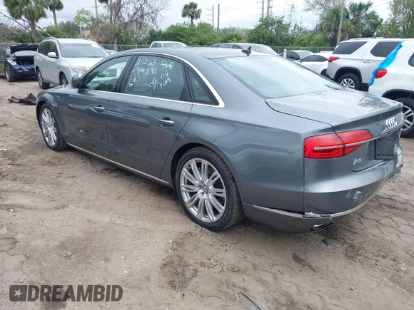 2015 Audi A8 3.0T z VIN WAU3GAFD5FN005065, wystawiony jako IAAI lot #41630450 z przebiegiem 122 939 mil mil oraz . Historia ofert i sprzedaży dostępna na DreamBid. Obrazek 3.