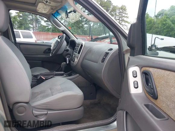 2006 Ford Escape XLT with VIN 1FMYU03146KD35945, listed as a IAAI auction lot 42337712 with 159,833 mi miles and . Bid and sale history available at DreamBid. Image 5.