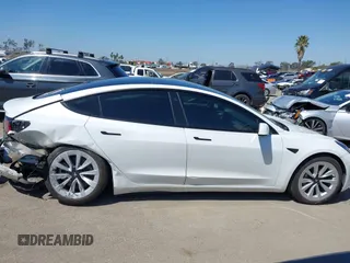 2022 Tesla Model 3 with VIN 5YJ3E1EA3NF294282, listed as a IAAI auction lot 41992046 with 22,383 mi miles. Bid and sale history available at carsss.com. Image 13.
