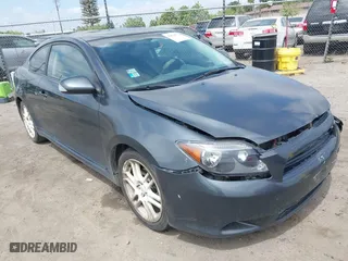 2006 Scion tC with VIN JTKDE177260081483, listed as a IAAI auction lot 42076072 with 156,556 mi miles. Bid and sale history available at carsss.com. Image 1.