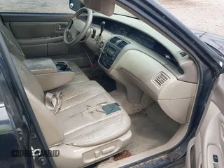 2001 Toyota Avalon XL z VIN 4T1BF28B61U191292, wystawiony jako IAAI lot #42239698 z przebiegiem 288 073 mil mil oraz . Historia ofert i sprzedaży dostępna na DreamBid. Obrazek 5.